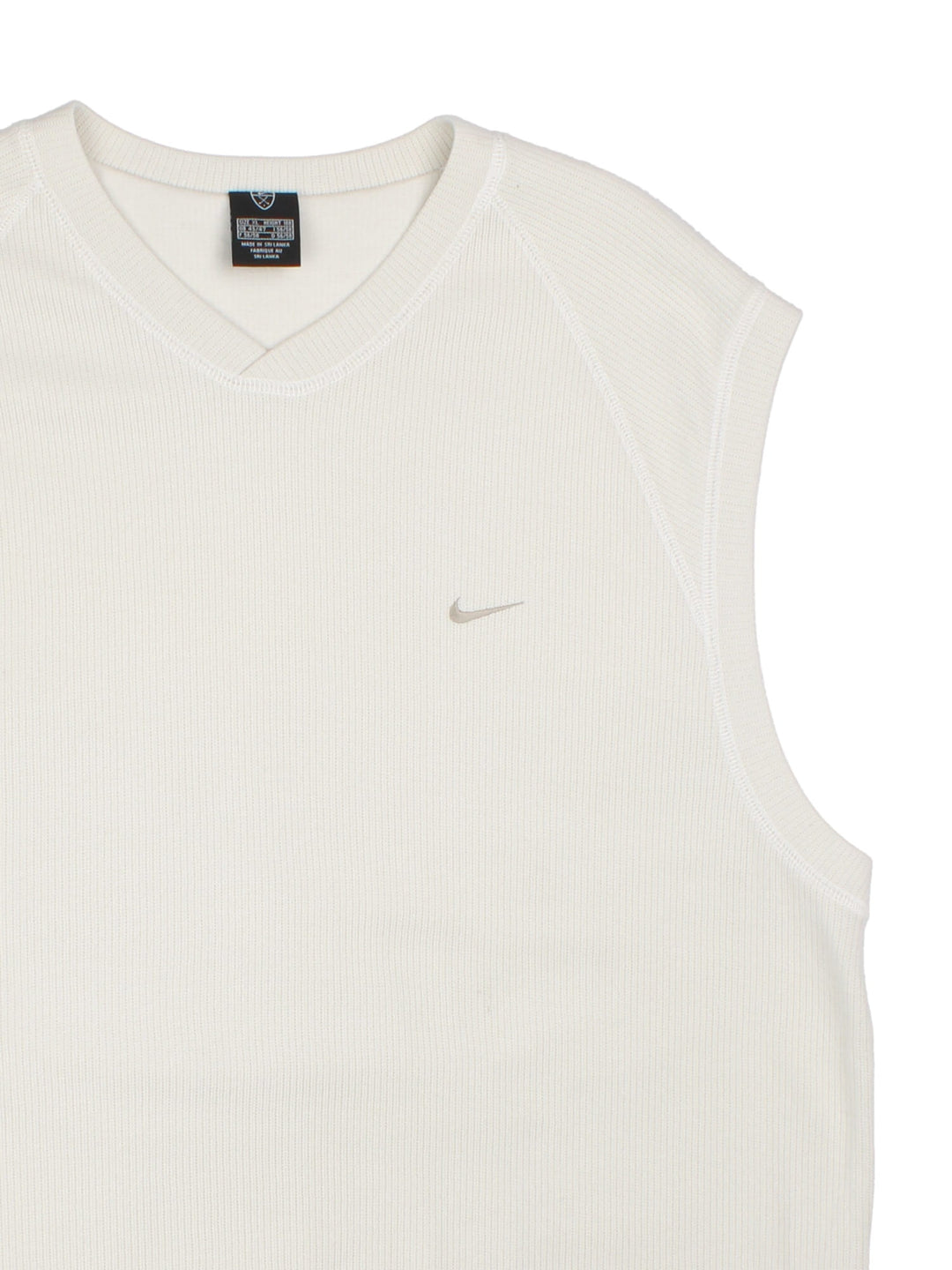 Vintage Nike golf vest in a white colourway with a small nike logo embroidered on the chest. 