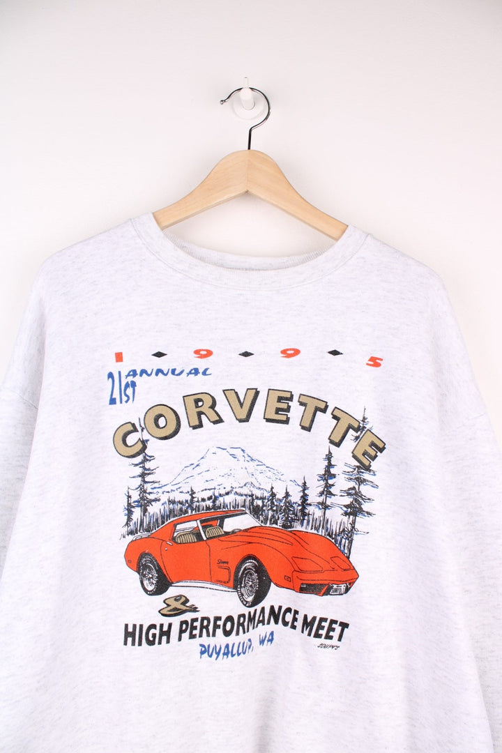 Corvette sweatshirt in grey marl with graphic of a red car amidst mountains, with text reading '21st Annual Corvette High Performance Meet, Puyallup, WA'.