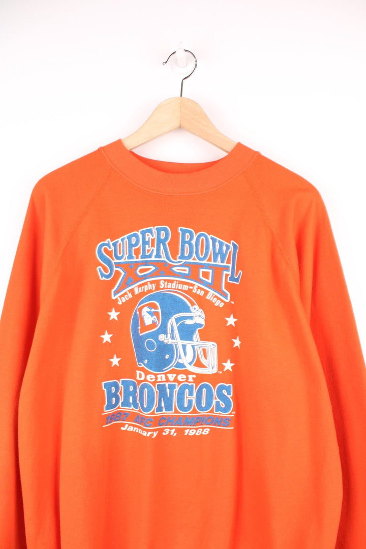 Vintage Denver Broncos, 1987 AFC Champions, Super Bowl sweatshirt in orange and blue.