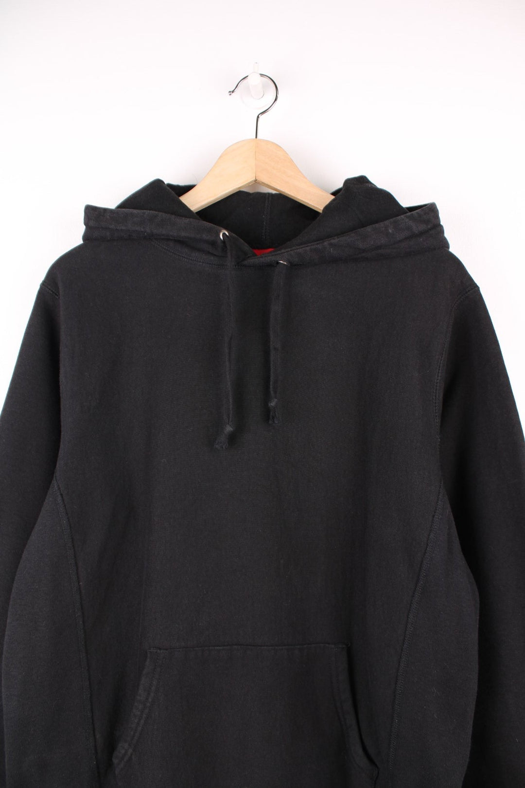 Supreme black classic script hoodie. Features pouch pocket and embroidered spell out logo on the hood.