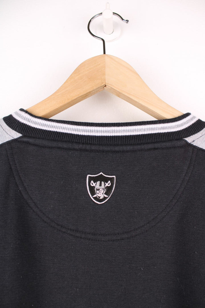 Las Vegas Raiders sweatshirt (previously Oakland) in black with embroidered spell out logo across the chest. 