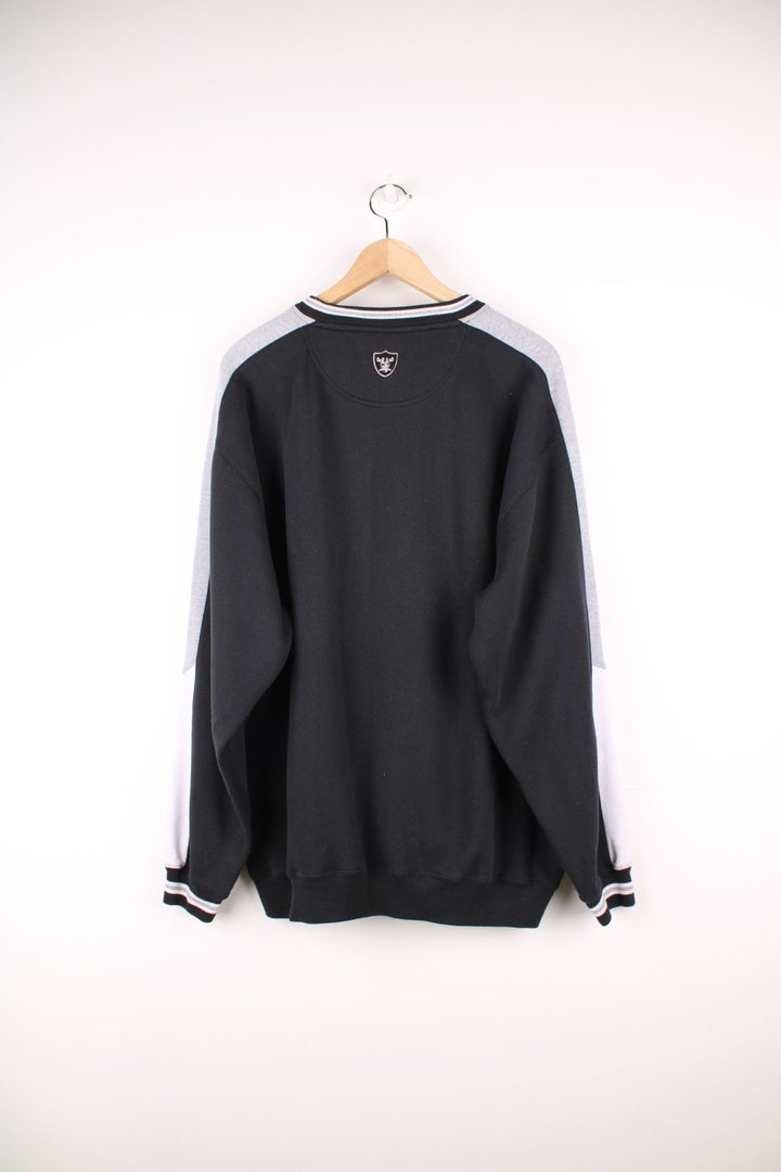 Las Vegas Raiders sweatshirt (previously Oakland) in black with embroidered spell out logo across the chest. 