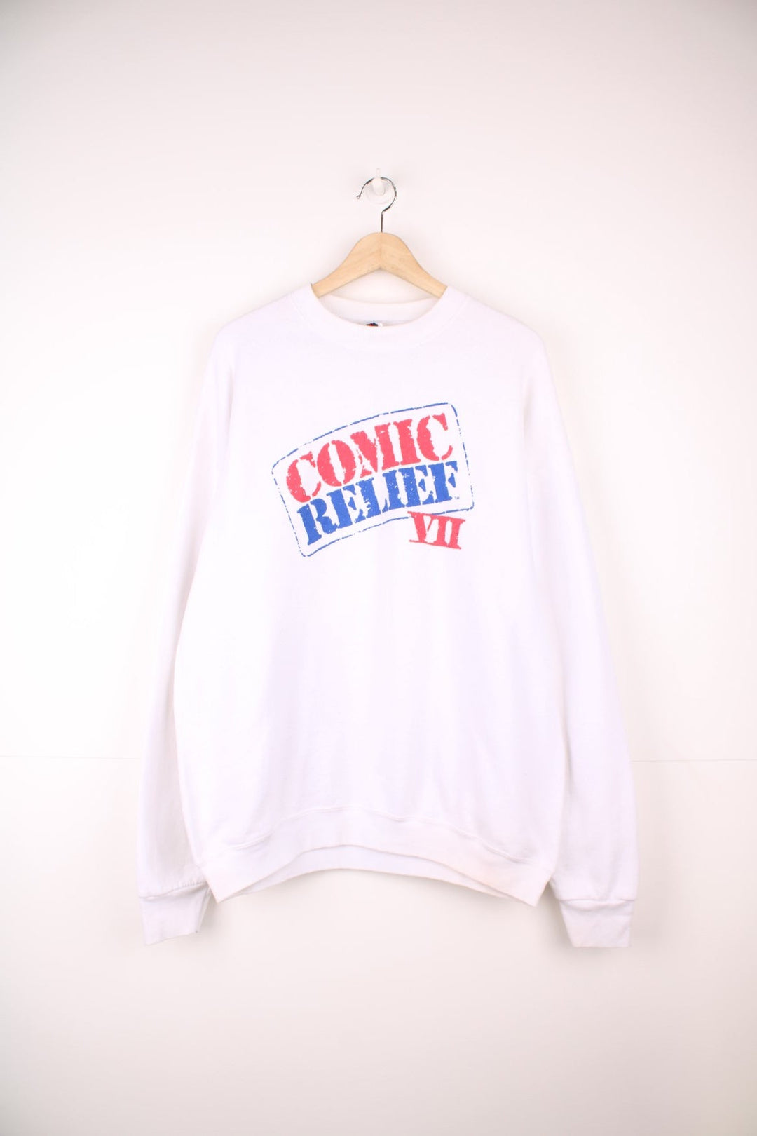 Comic Relief VII sweatshirt with stamp-effect logo in red and blue on the front, and a multicoloured cast-list on the reverse.