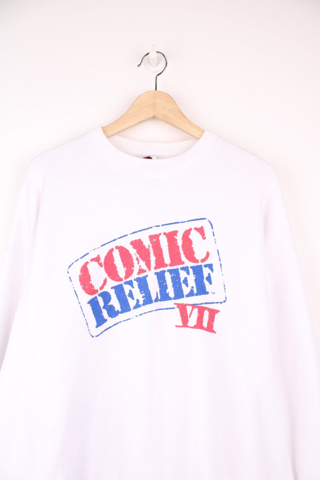 Comic Relief VII sweatshirt with stamp-effect logo in red and blue on the front, and a multicoloured cast-list on the reverse.