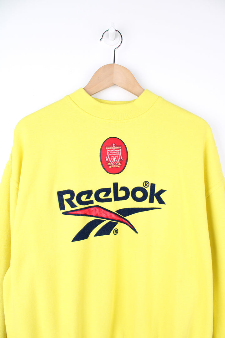 Vintage Reebok x Liverpool F.C bright yellow crewneck sweatshirt, features spell-out logo and embroidered badges