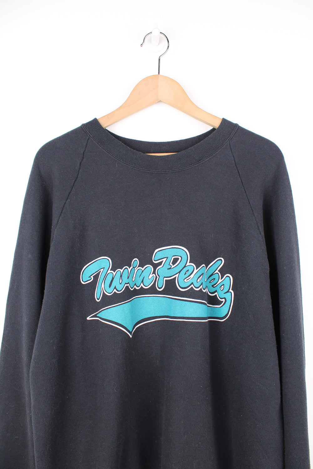 Vintage 1990's Fruit of Loom, made in USA  Twin Peaks crewneck sweatshirt with blue spell-out motif on the front 