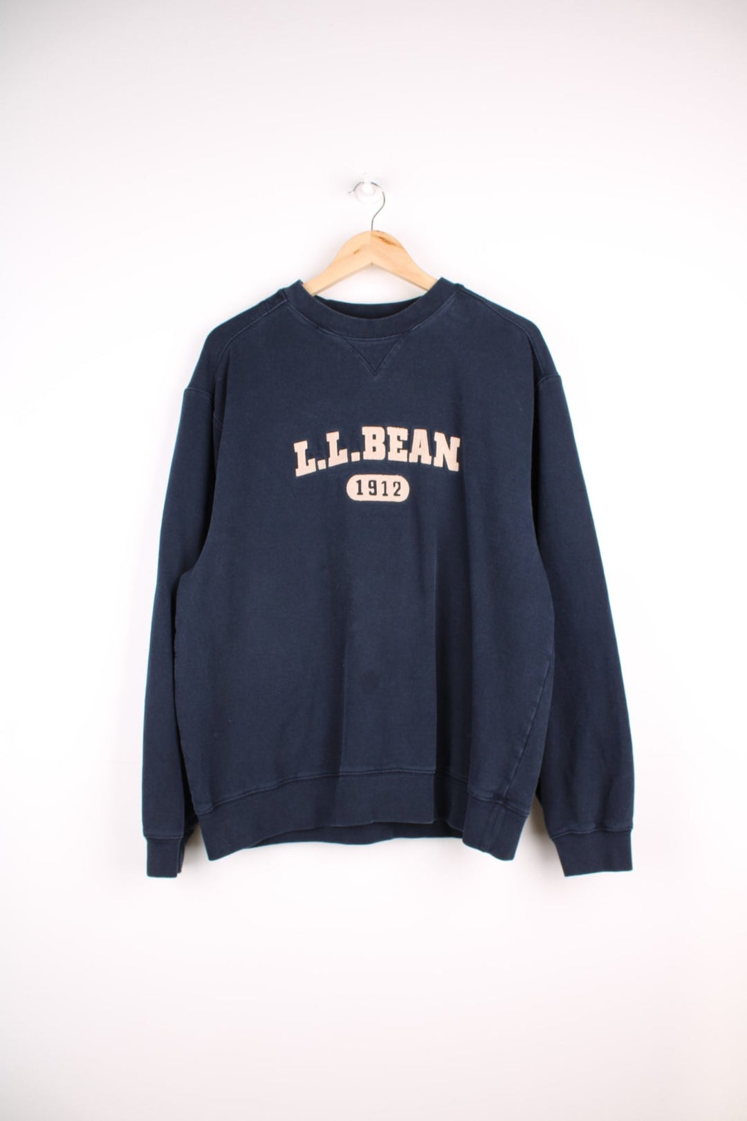  L.L Bean sweatshirt in a navy blue featuring a large embroidered logo across the chest.