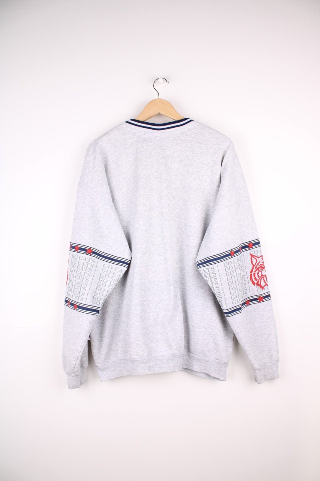  Vintage University of Arizona Wildcats Sweatshirt in grey marl with a printed logo across the chest and wrapping around sleeves.