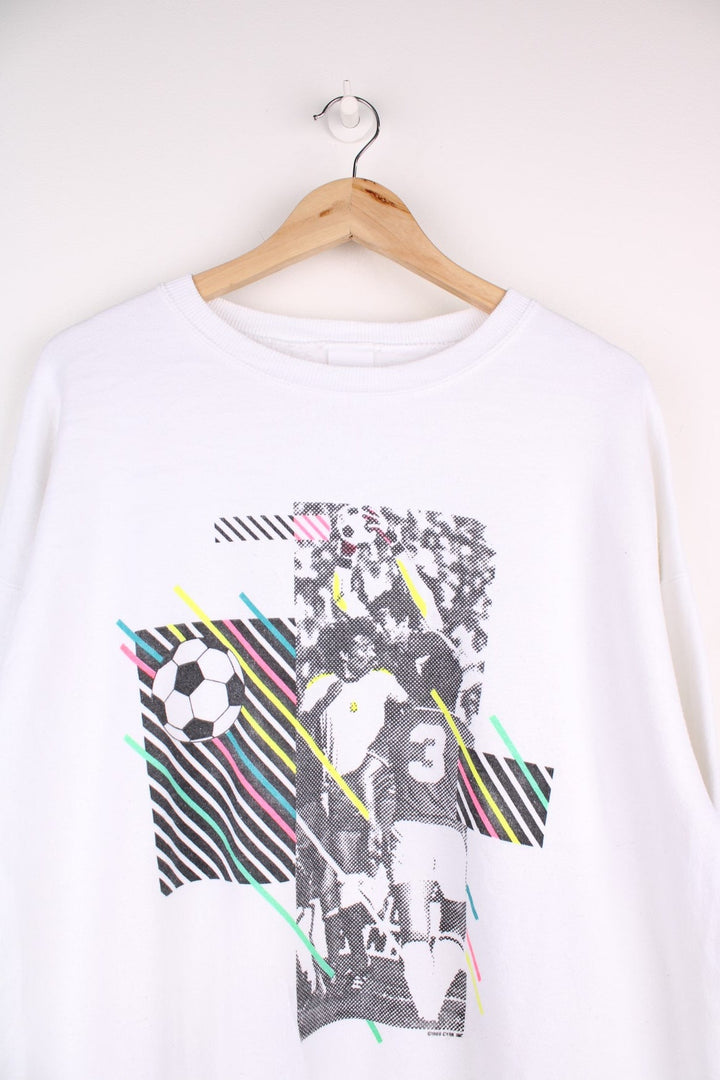 1989 Vintage Sweatshirt in a white colourway with a multicoloured neon football graphic across the front and on the back.