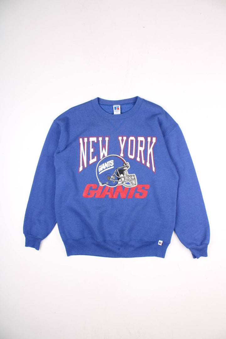 Vintage Russell Athletic Sweatshirt in a blue colourway with the New York Giants logo screenprinted on the front. Label dates the sweatshirt to the 90s, made in the USA. 