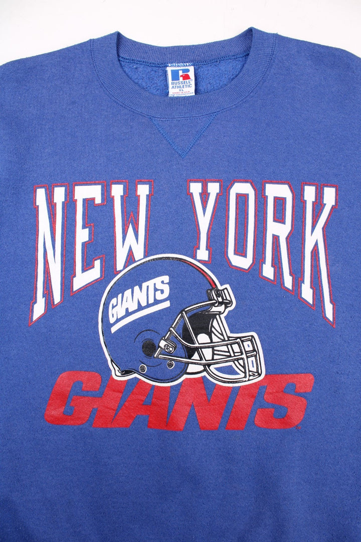 Vintage Russell Athletic Sweatshirt in a blue colourway with the New York Giants logo screenprinted on the front. Label dates the sweatshirt to the 90s, made in the USA. 