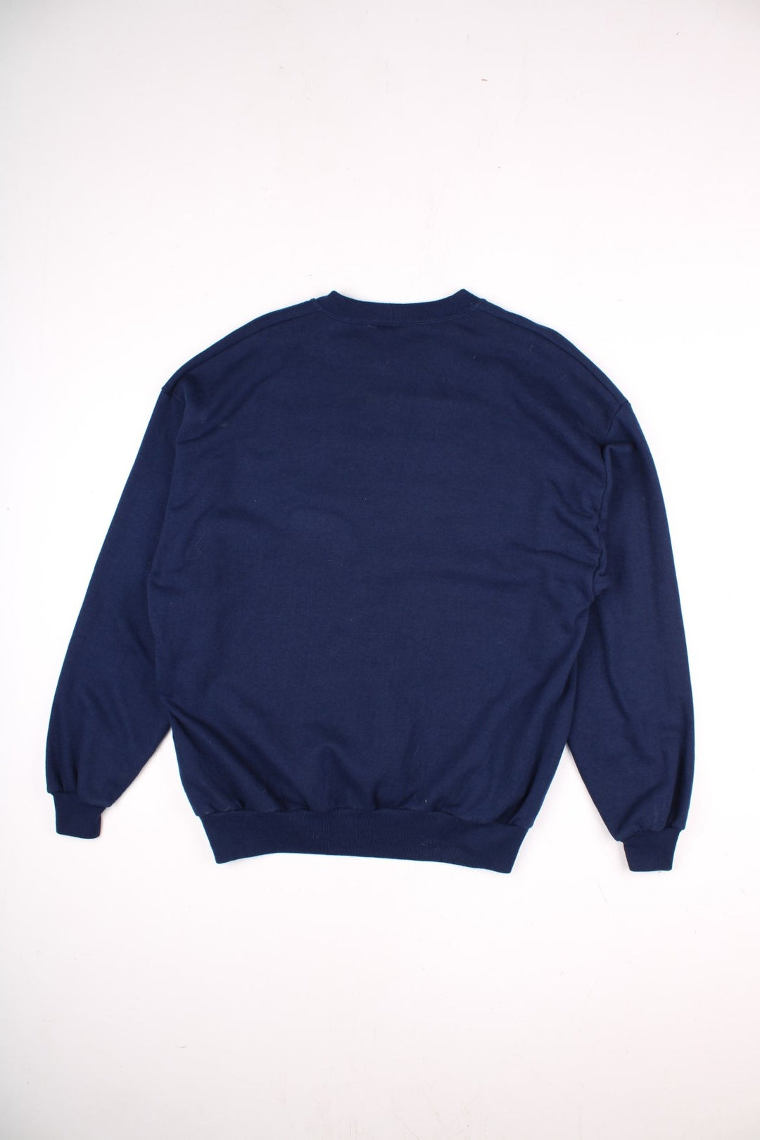 Vintage Tennesse Titans Sweatshirt in a navy blue colourway with the Titans logo embroidered on the front.