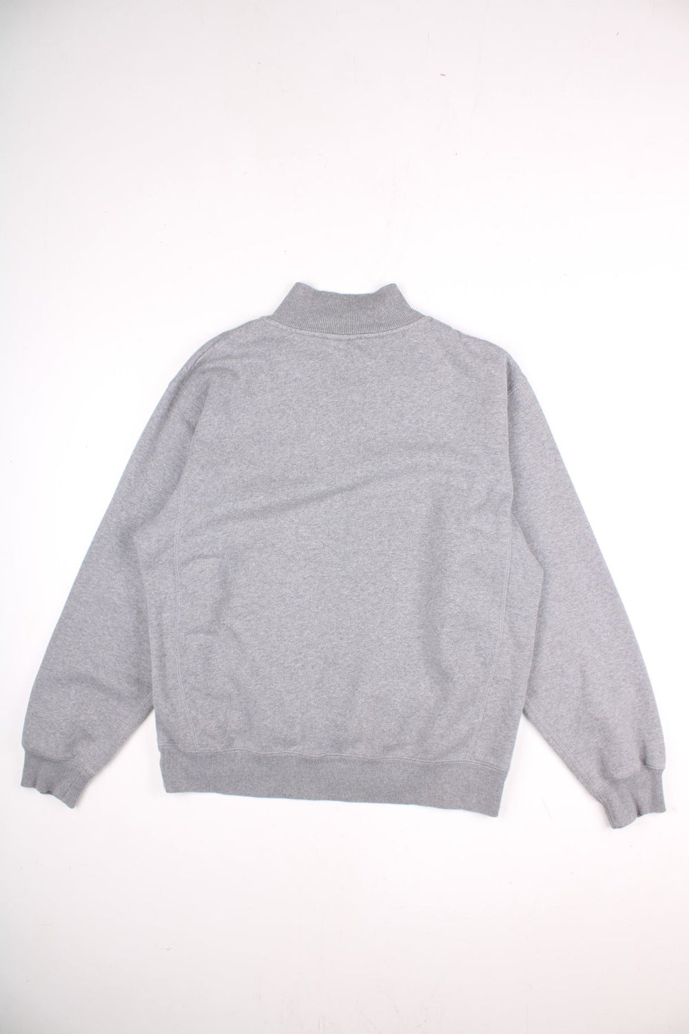 Vintage Nike 1/4 zip sweatshirt in a grey colourway with a small nike logo embroidered on the front. 