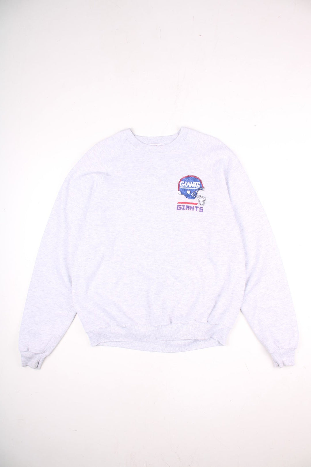 Vintage New York Giants sweatshirt in a light grey colourway with the logo cross stitched on the front.