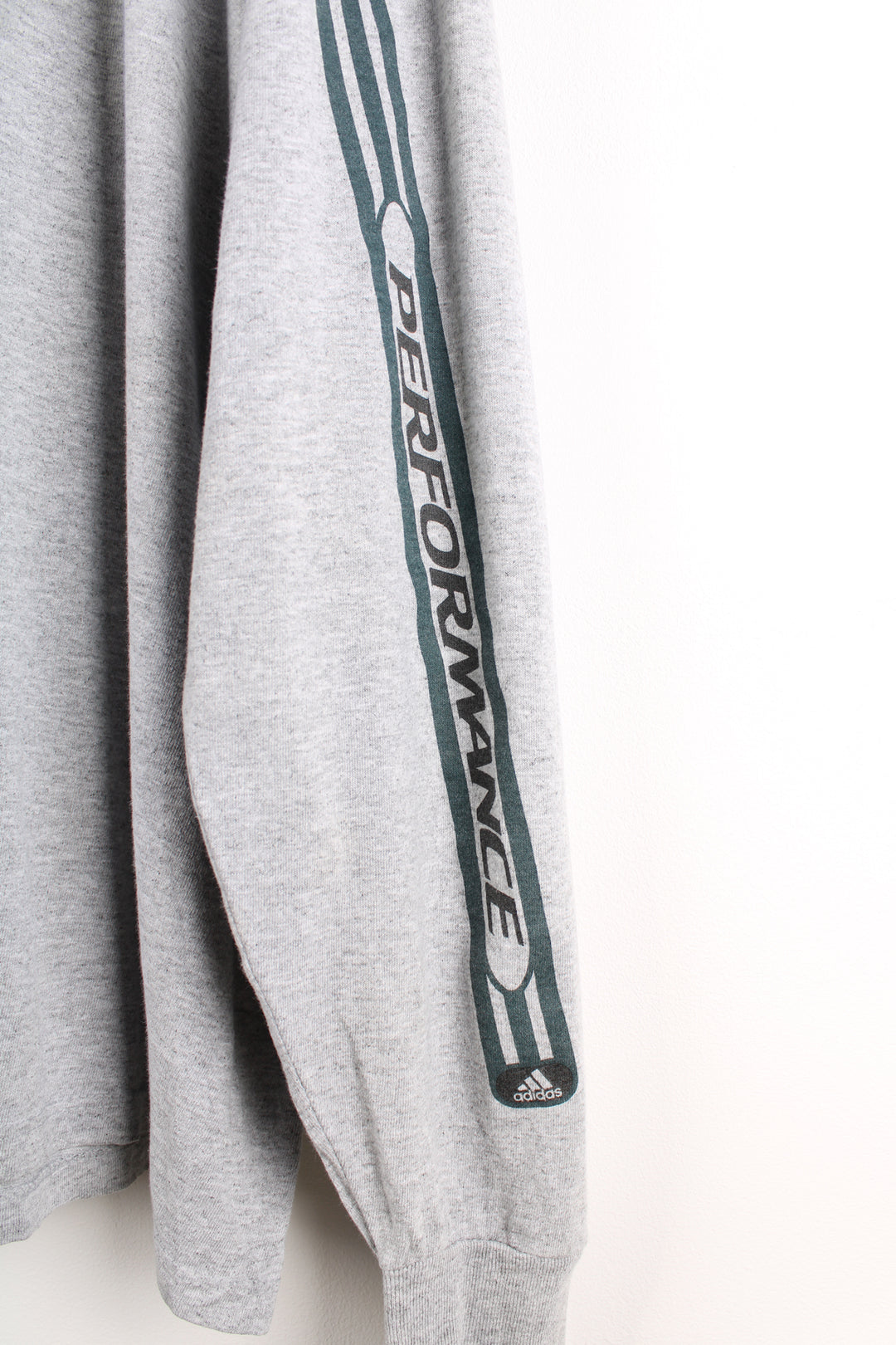 Adidas Performance grey long-sleeve t-shirt, features printed three stripe details across the chest and down the sleeves