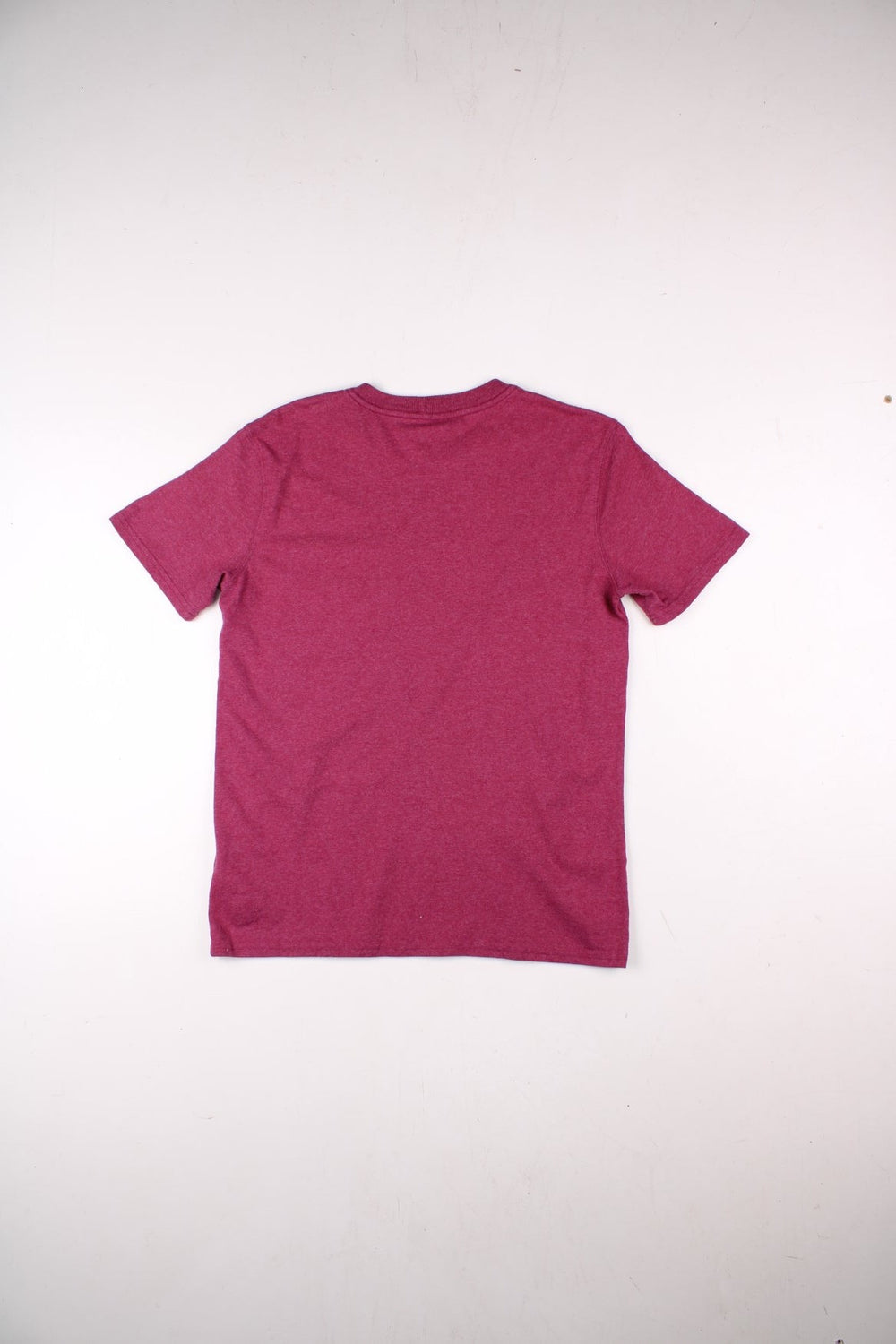 Carhartt Pocket T-Shirt in a maroon red colourway, has a chest pocket with the logo embroidered on the front.