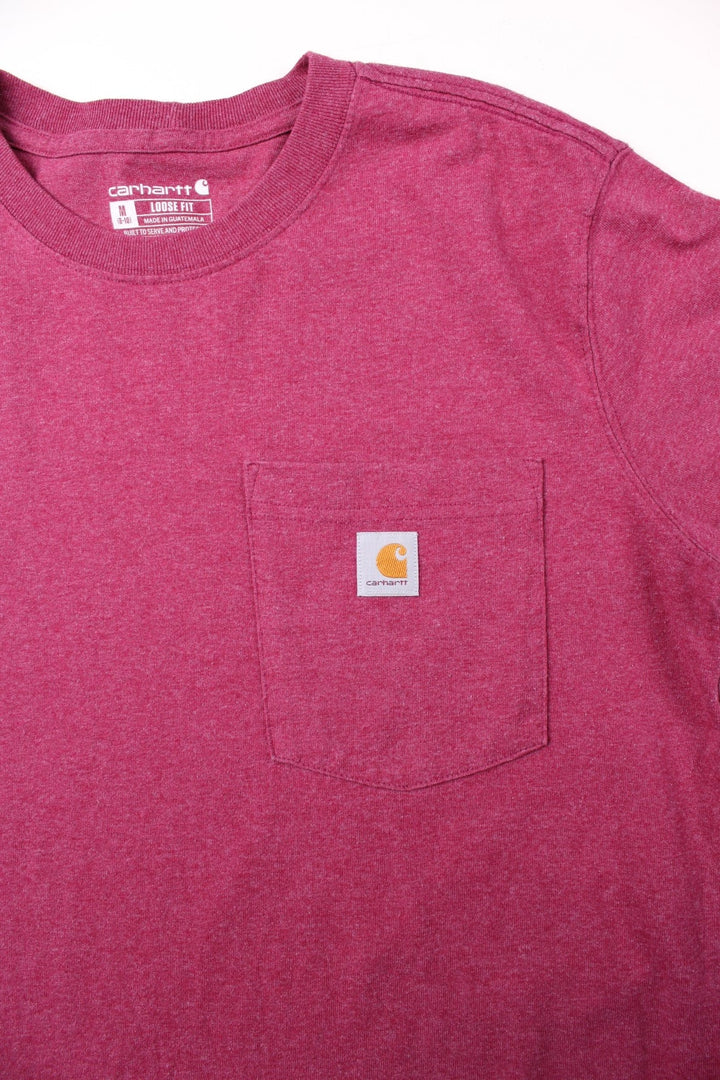 Carhartt Pocket T-Shirt in a maroon red colourway, has a chest pocket with the logo embroidered on the front.