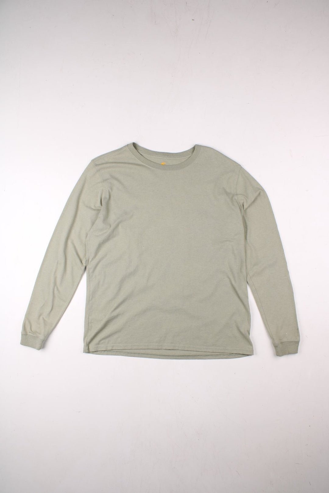 Carhartt Long-Sleeve T-Shirt in a green colourway with the spell out logo printed down the left sleeve.