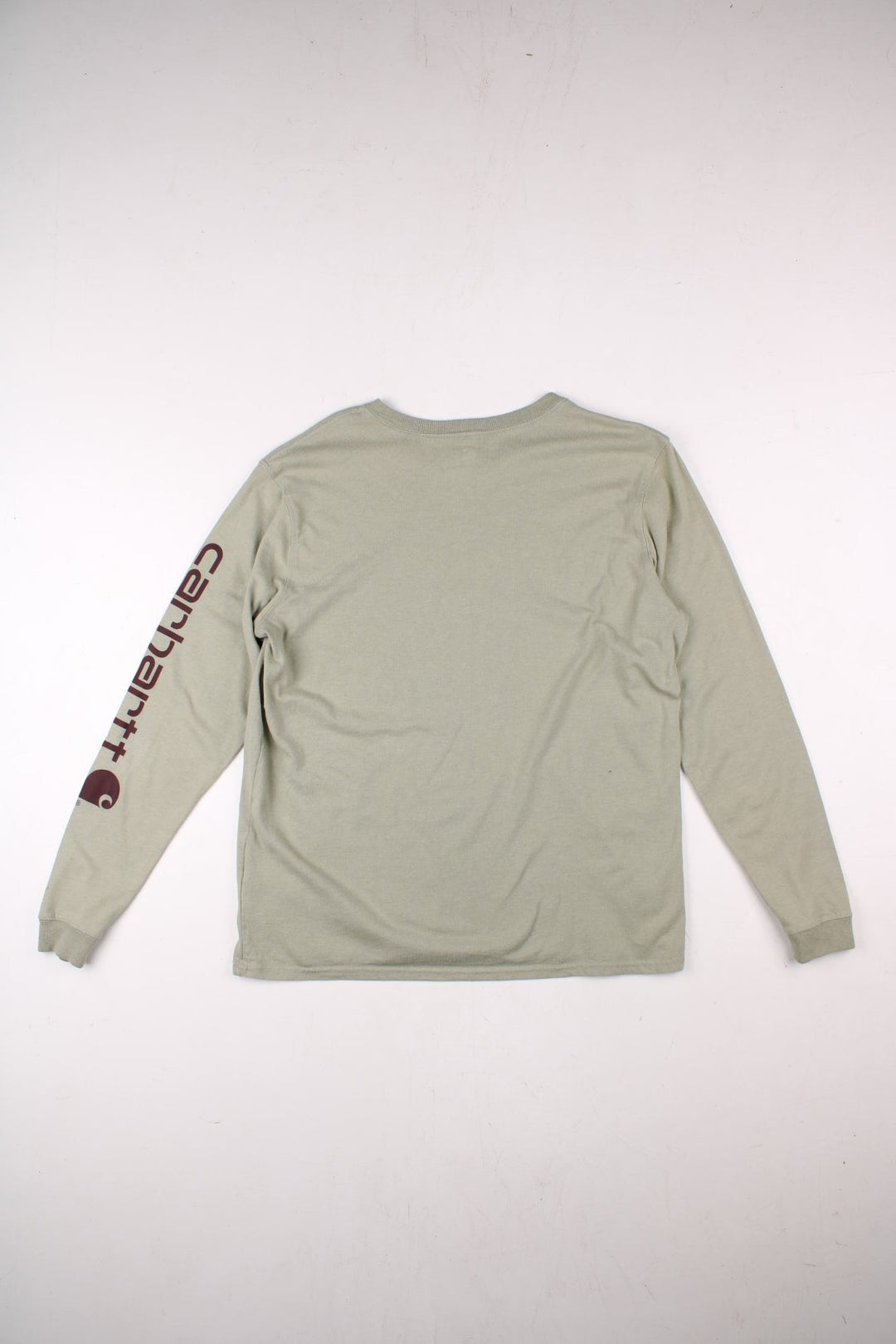 Carhartt Long-Sleeve T-Shirt in a green colourway with the spell out logo printed down the left sleeve.