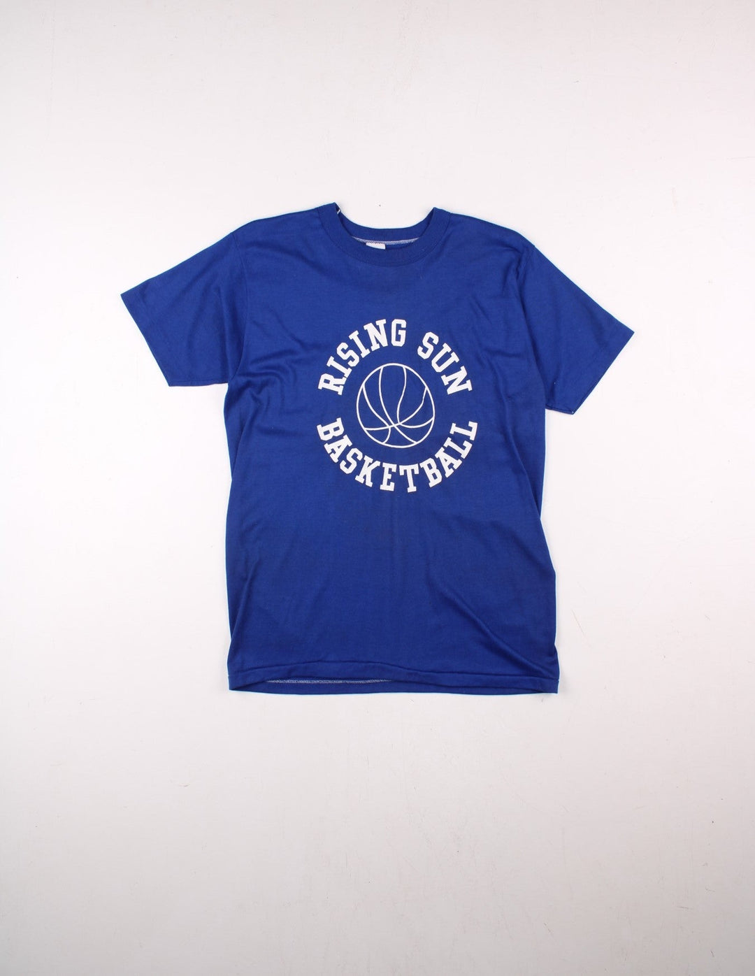 Vintage 80's Rising Sun Basketball Graphic Single Stitch T-Shirt in a blue colourway with the spell out logo and graphic printed on the front.