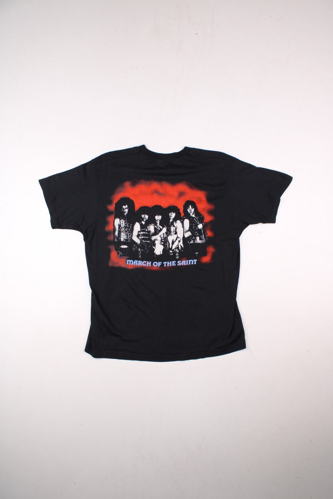 Vintage 80's Armored Saint March Of The Saint single stitch T-Shirt in a black colourway with a medieval knights graphic printed on the front, and the bands pictured and spell out printed on the back.