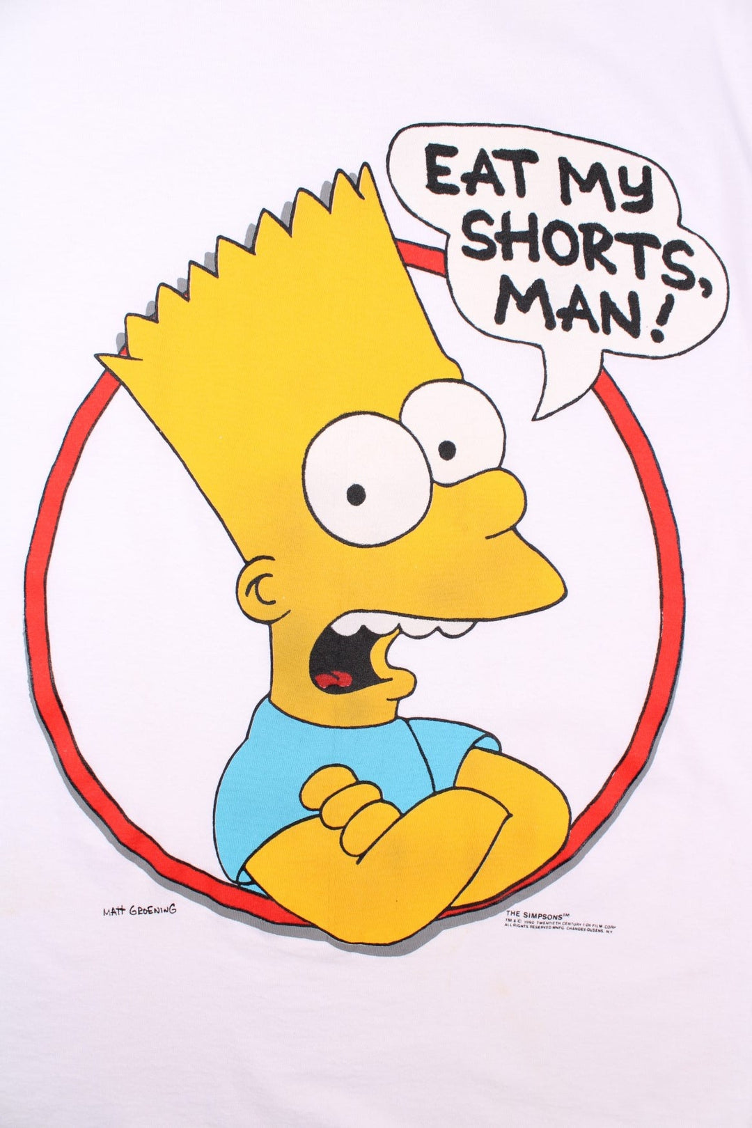 Vintage 1990 The Simspons Bart Eat My Shorts Graphic single stitch T-Shirt by Matt Groening, in a white colourway with the Bart graphic and spell out printed on the front.