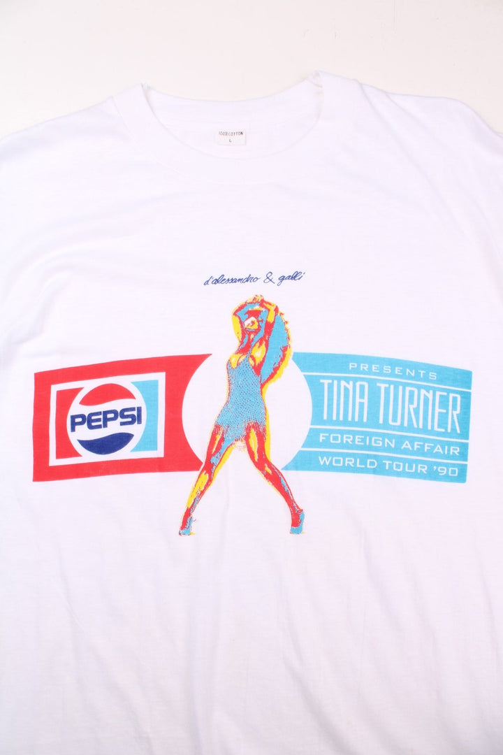 Vintage 90's Tina Turner x Pepsi Foreign Affair World Tour single stitch T-Shirt in a white colourway with the spell out logos and graphic printed on the front.