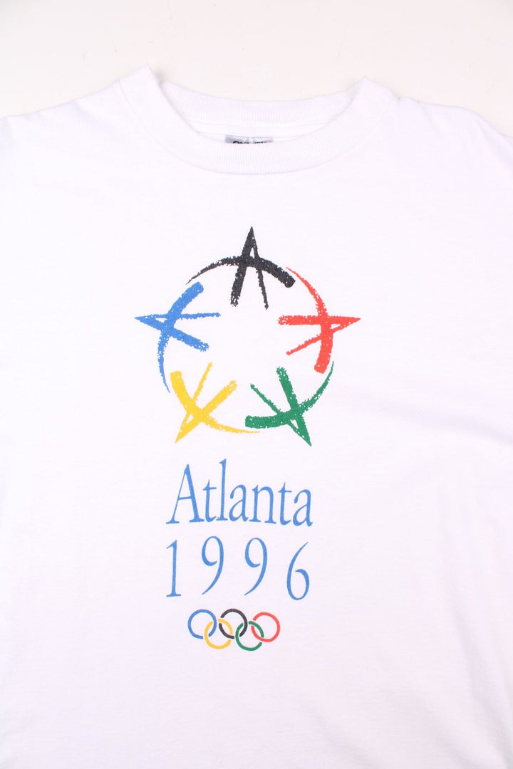 Vintage 1996 Atlanta Olympics single stitch graphic T-Shirt in a white colourway with the logo and graphic printed on the front.