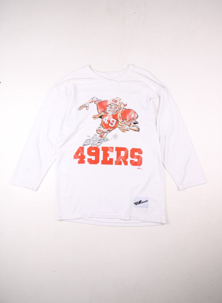 Vintage San Francisco 49ers NFL Jack Davis Graphic Jersey T-Shirt in a white colourway with the spell out logo and Jack Davis football illustration graphic printed on the front.