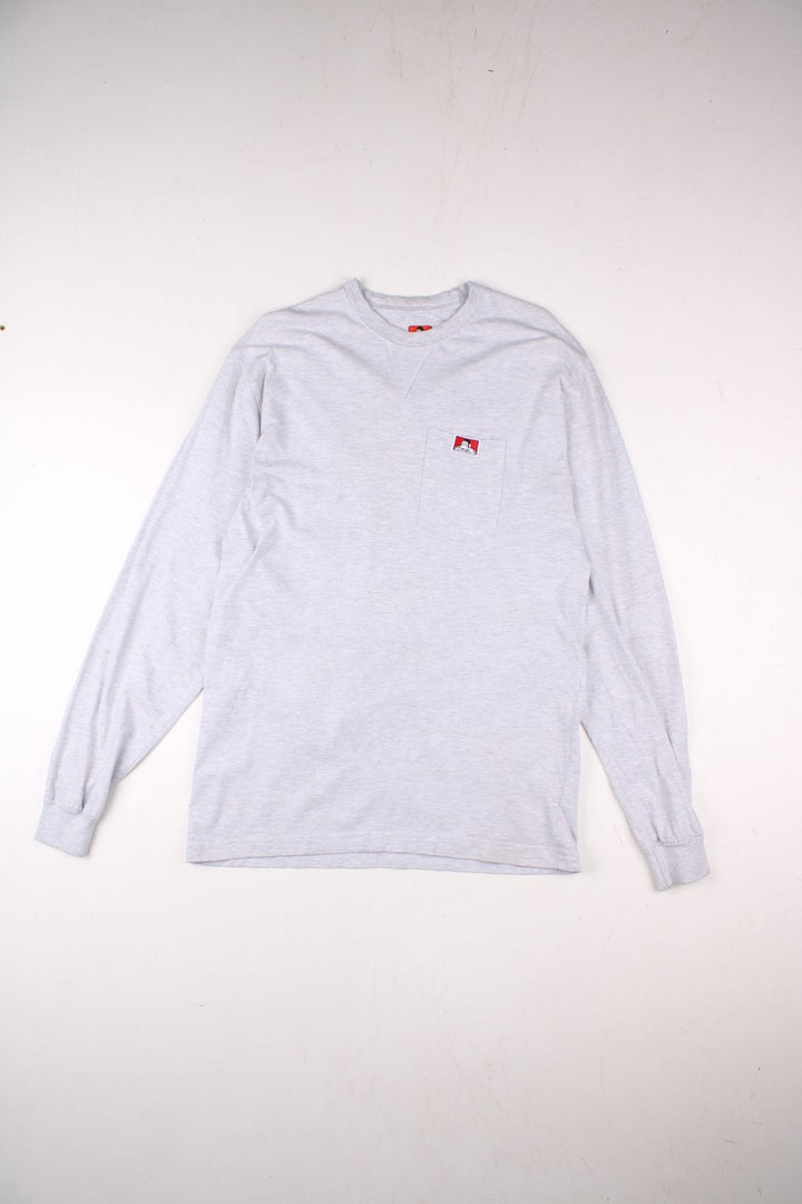 Vintage Ben Davis Long-Sleeve Pocket T-Shirt in a grey colourway, has a chest pock with the logo embroidered on the front.