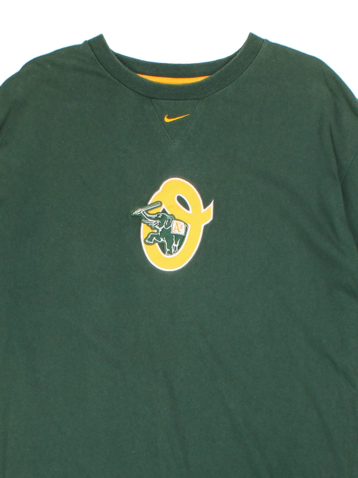 Vintage Nike NFL Oakland Athletics T-shirt in a green colourway, logo embroidered on front and sleeve.