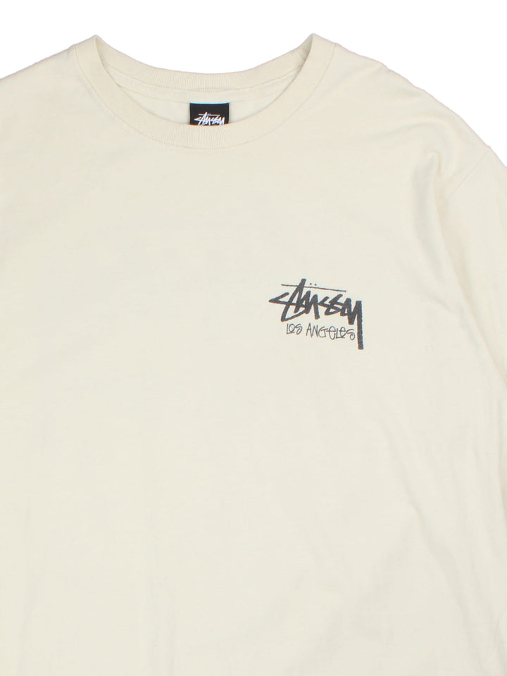 Stussy t-shirt in a white colourway, graphic printed on front and back.