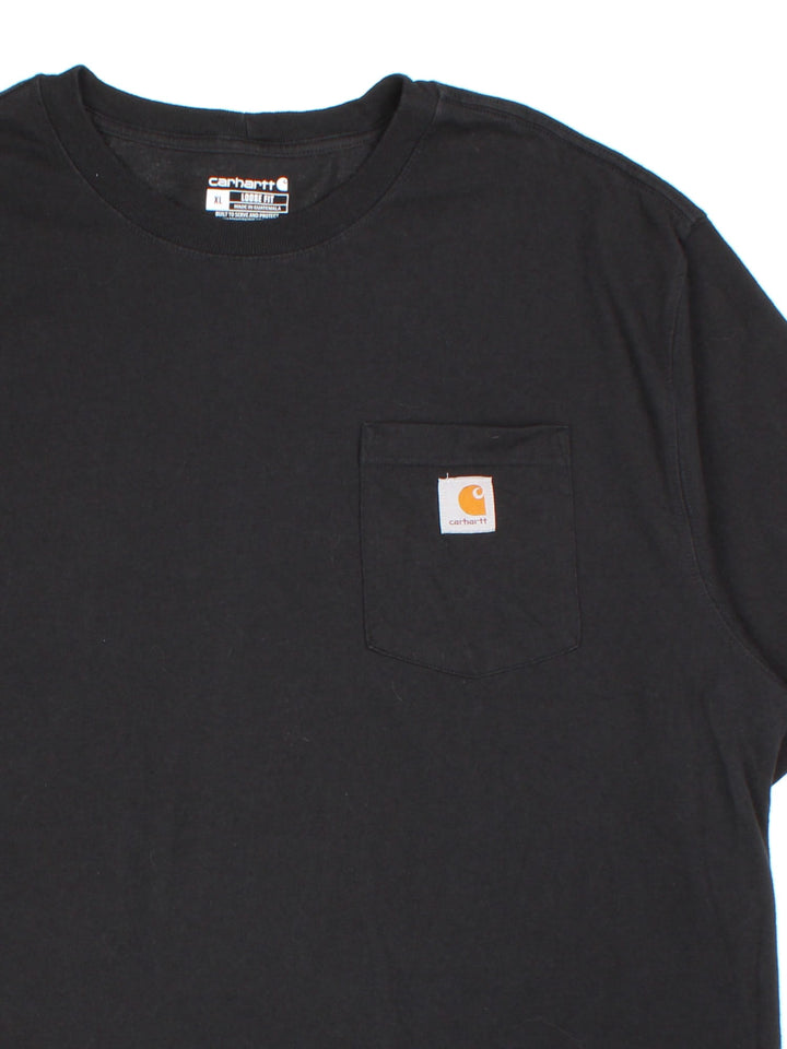 Carhartt T-shirt in a black colourway, branding on front pocket.