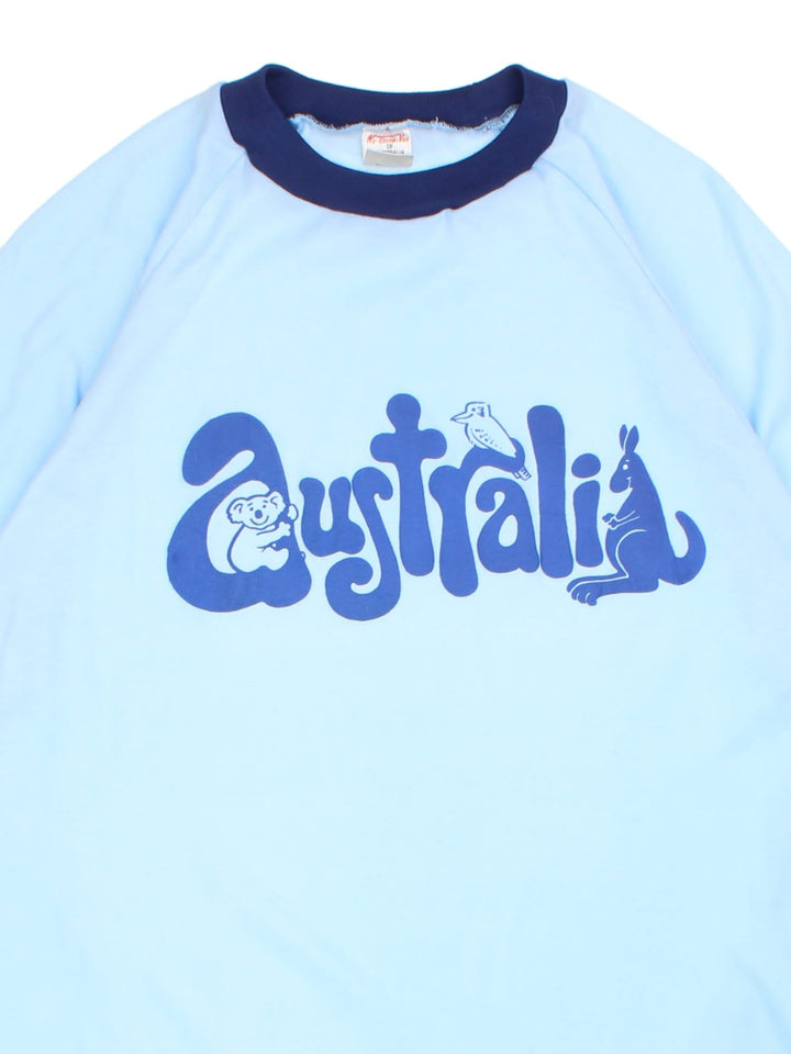 Vintage Australia Ringer T-Shirt in a blue colourway with puff print spell out across the front.