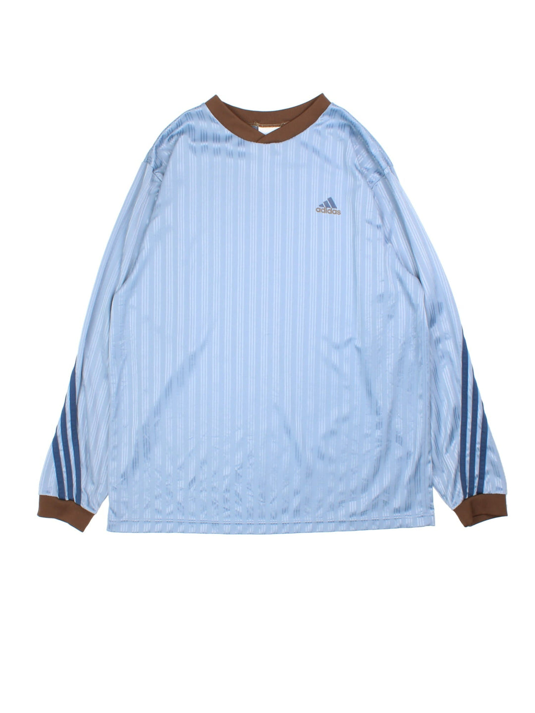 Vintage 90's Adidas Long Sleeve Training Top in a blue colourway with brown collar and cuffs, has the iconic three stripes going down the sleeves, and the logo printed on the front.