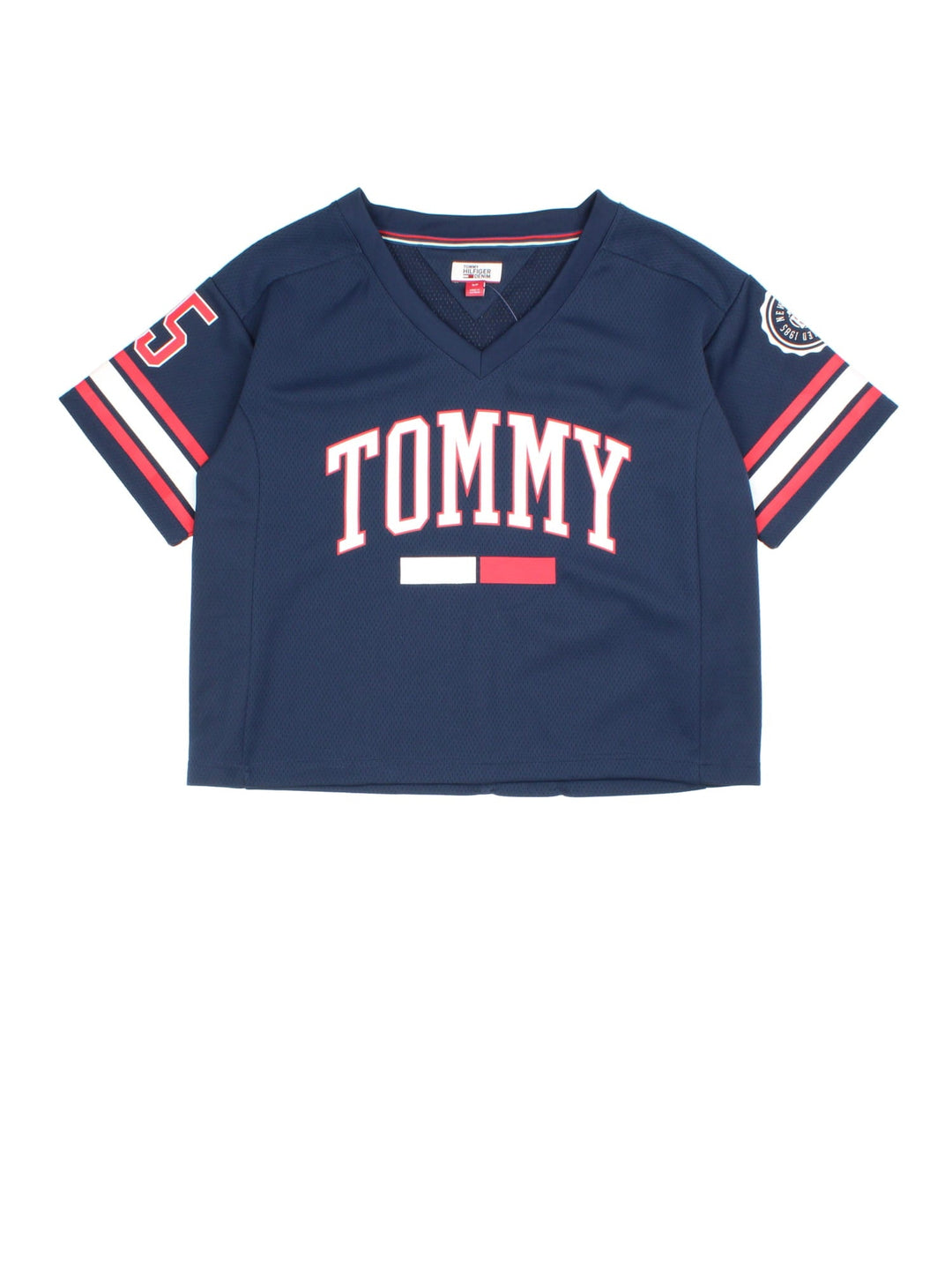 Tommy Hilfiger Cropped Jersey in a blue, white and red colourway with the logo printed on the front, back and sleeves, new with tag still on.