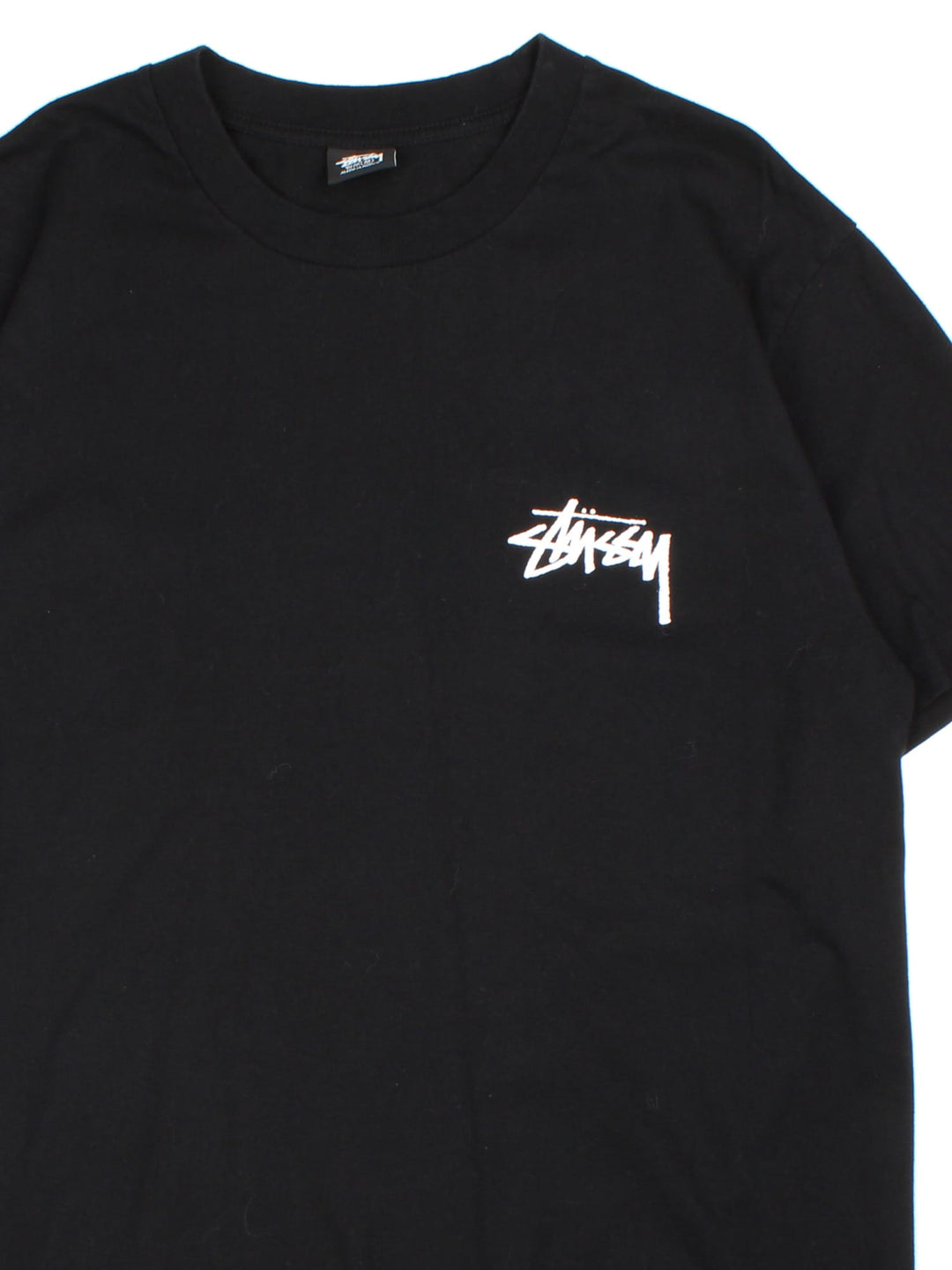 Stussy Plush T-Shirt in a black colourway with the logo printed on the front, and on the back 8 ball graphic bears.