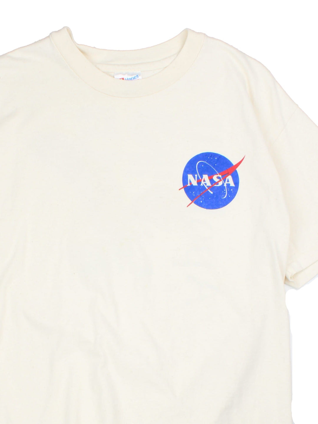 Vintage 90's NASA Apollo 25 Graphic T-Shirt in a tan colourway with the logo on the front, as well as spell out and Eagle graphic printed on the back.