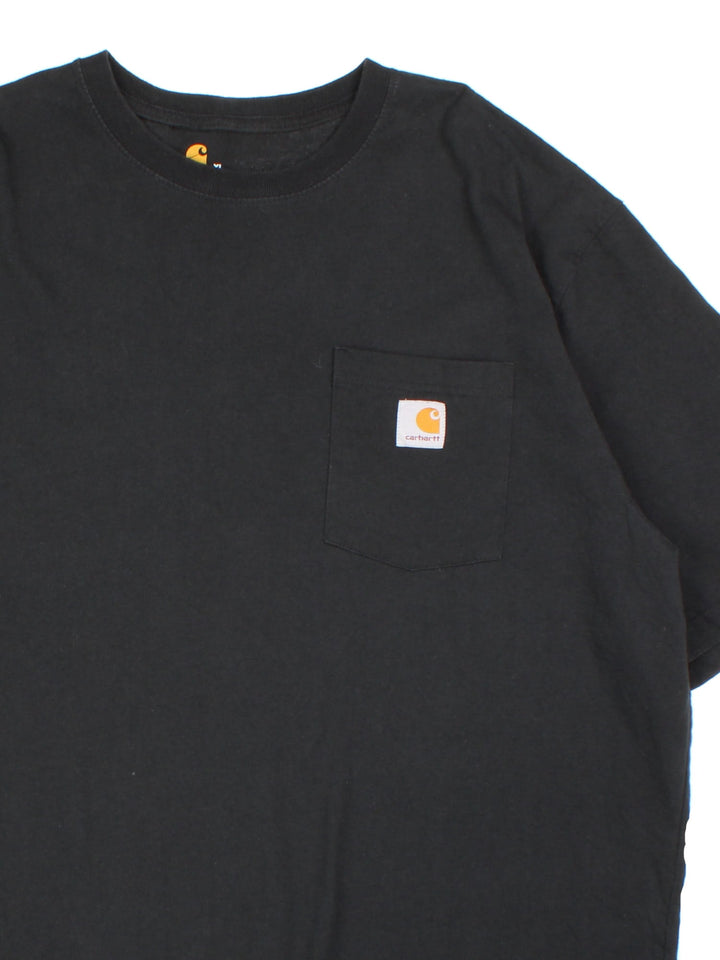 Carhartt T-Shirt in a black colourway with pocket and small logo on the front.