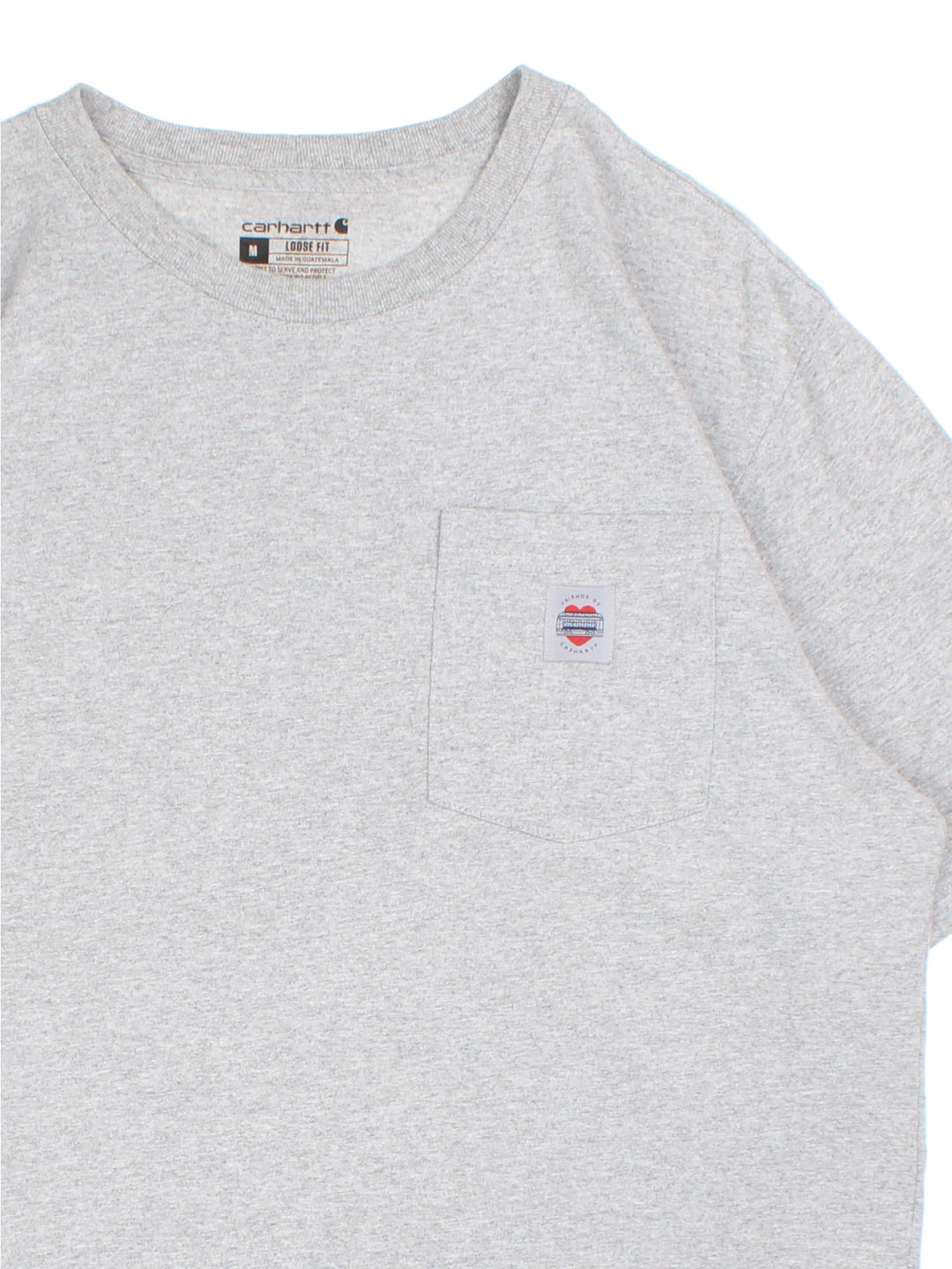 Carhartt Friends of Carhartt T-Shirt in a grey colourway with small logo and pocket on the front and large graphic on the back.