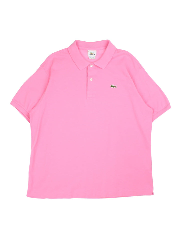 Lacoste Polo Shirt in a pink colourway with classic logo on on the front.