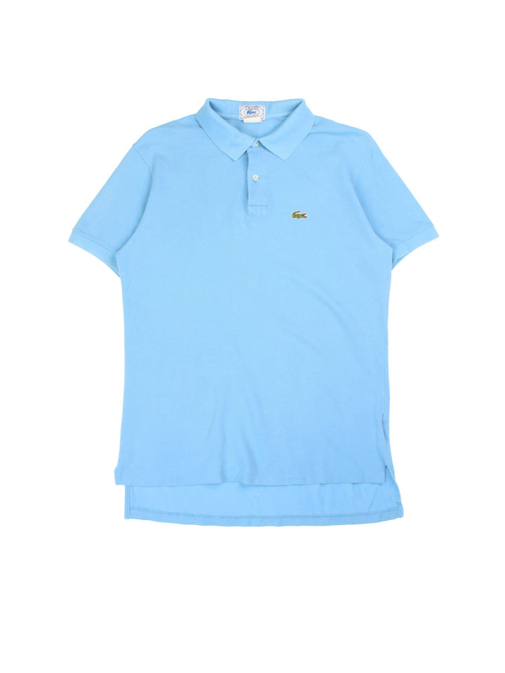 Lacoste IZOD Polo Shirt in a blue colourway with classic logo on the front.