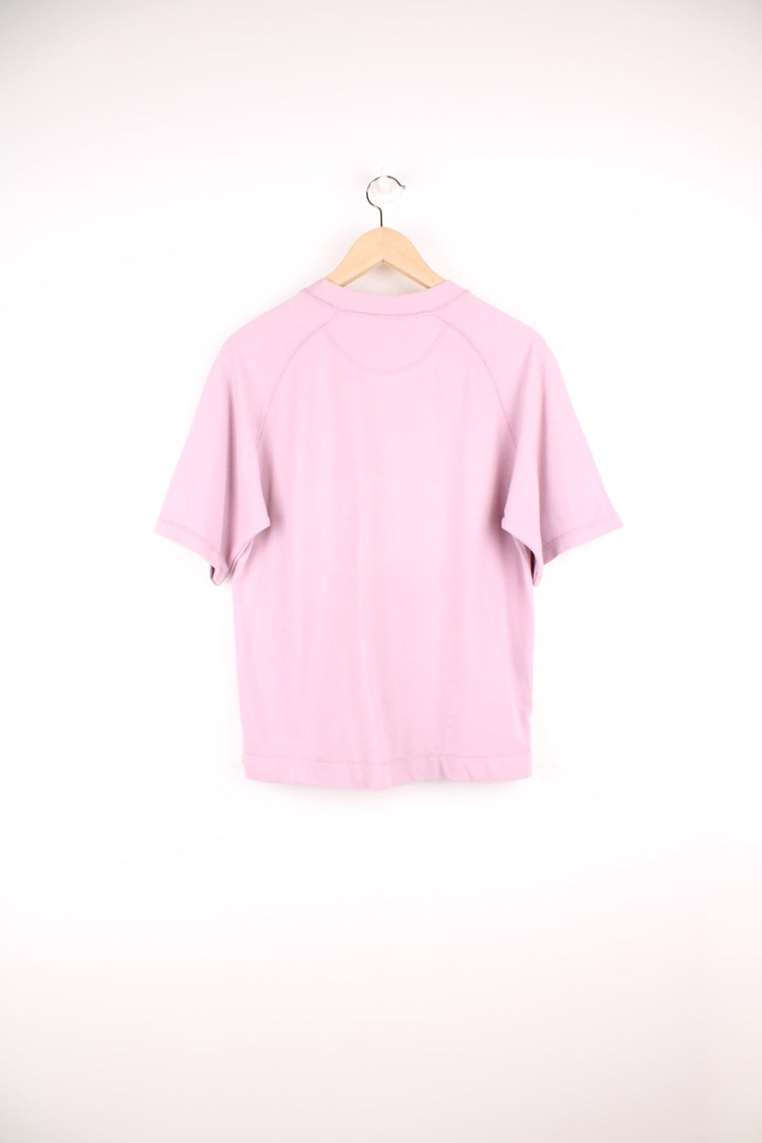 Pale pink Reebok Freestyle spellout t-shirt with small logo tag on left sleeve, and 'Freestyle' tag on lower right hem.