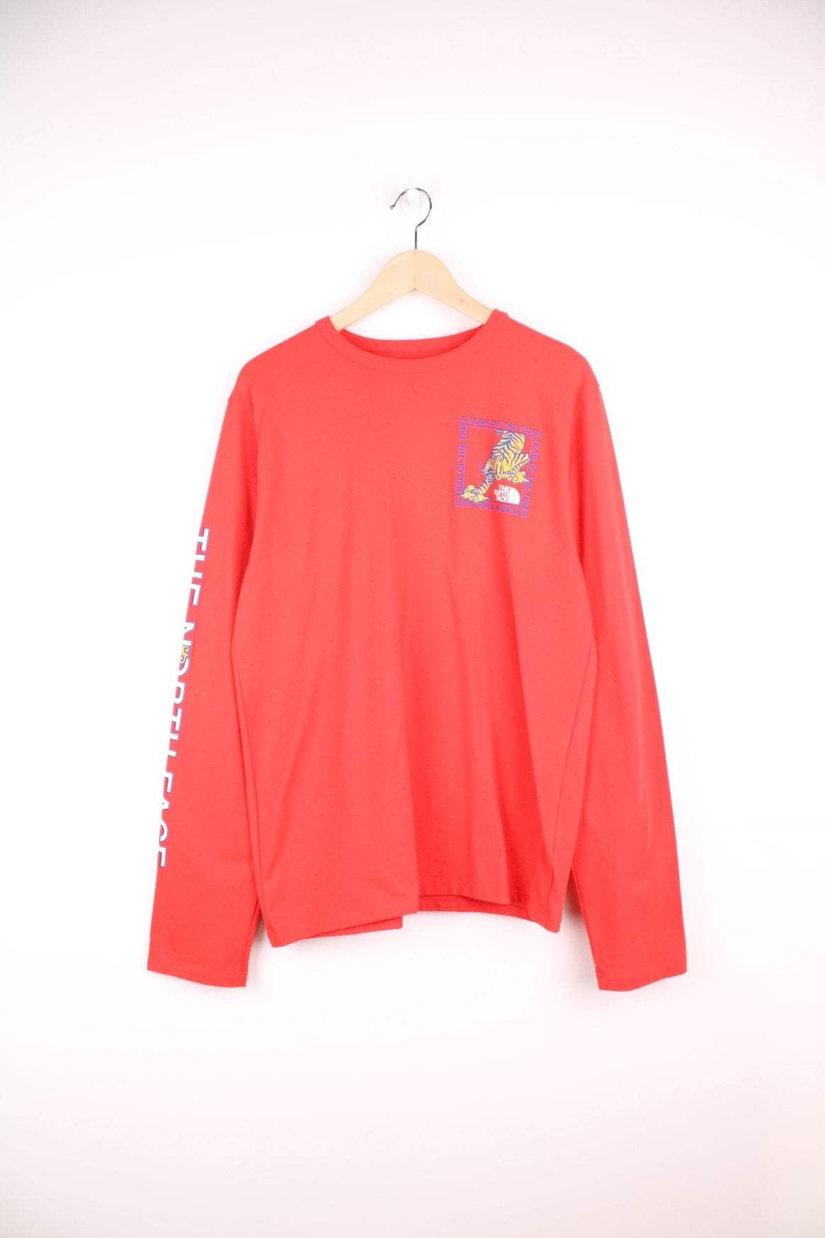 Red North Face long-sleeved t-shirt with &