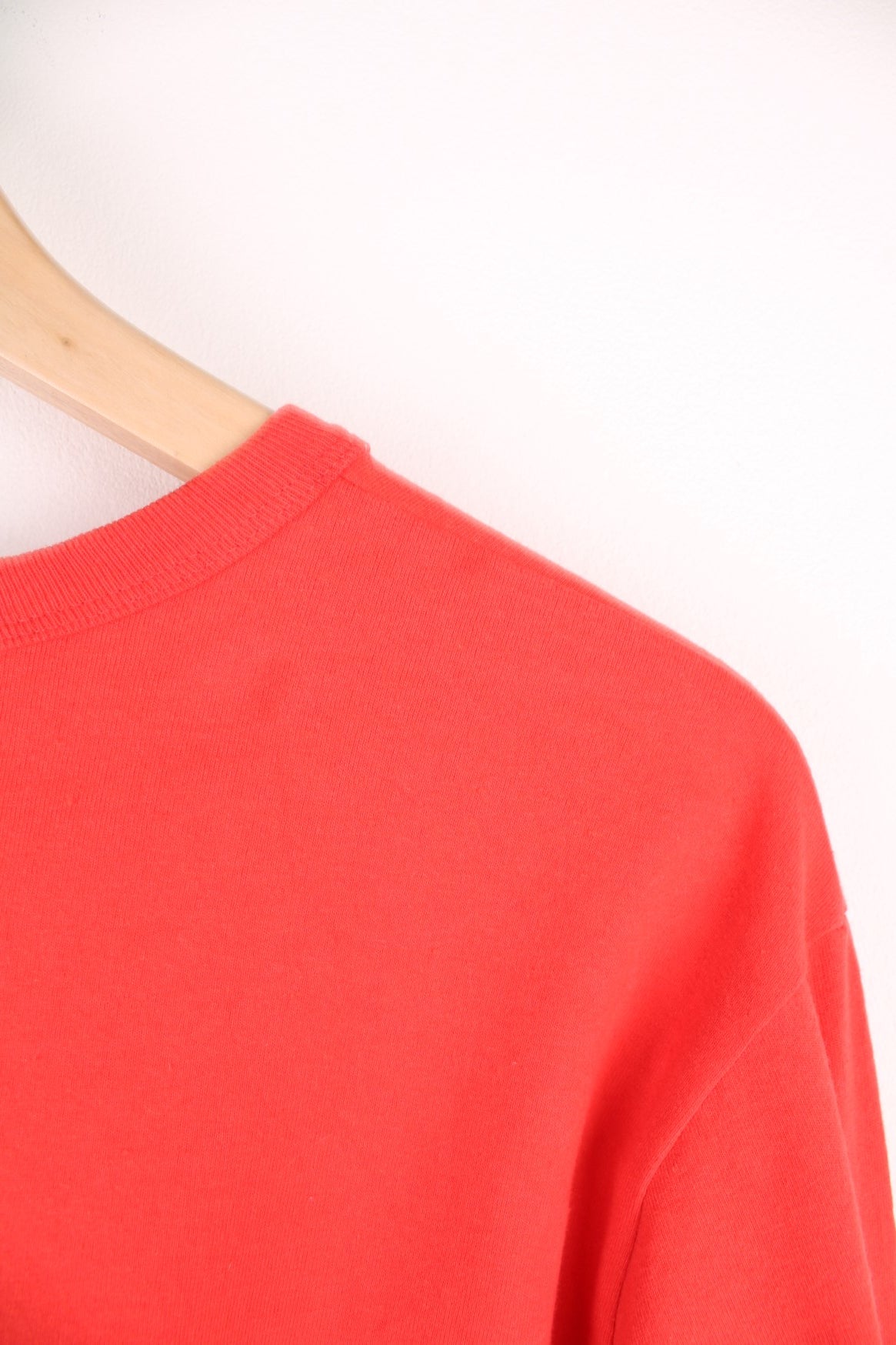 Red North Face long-sleeved t-shirt with &