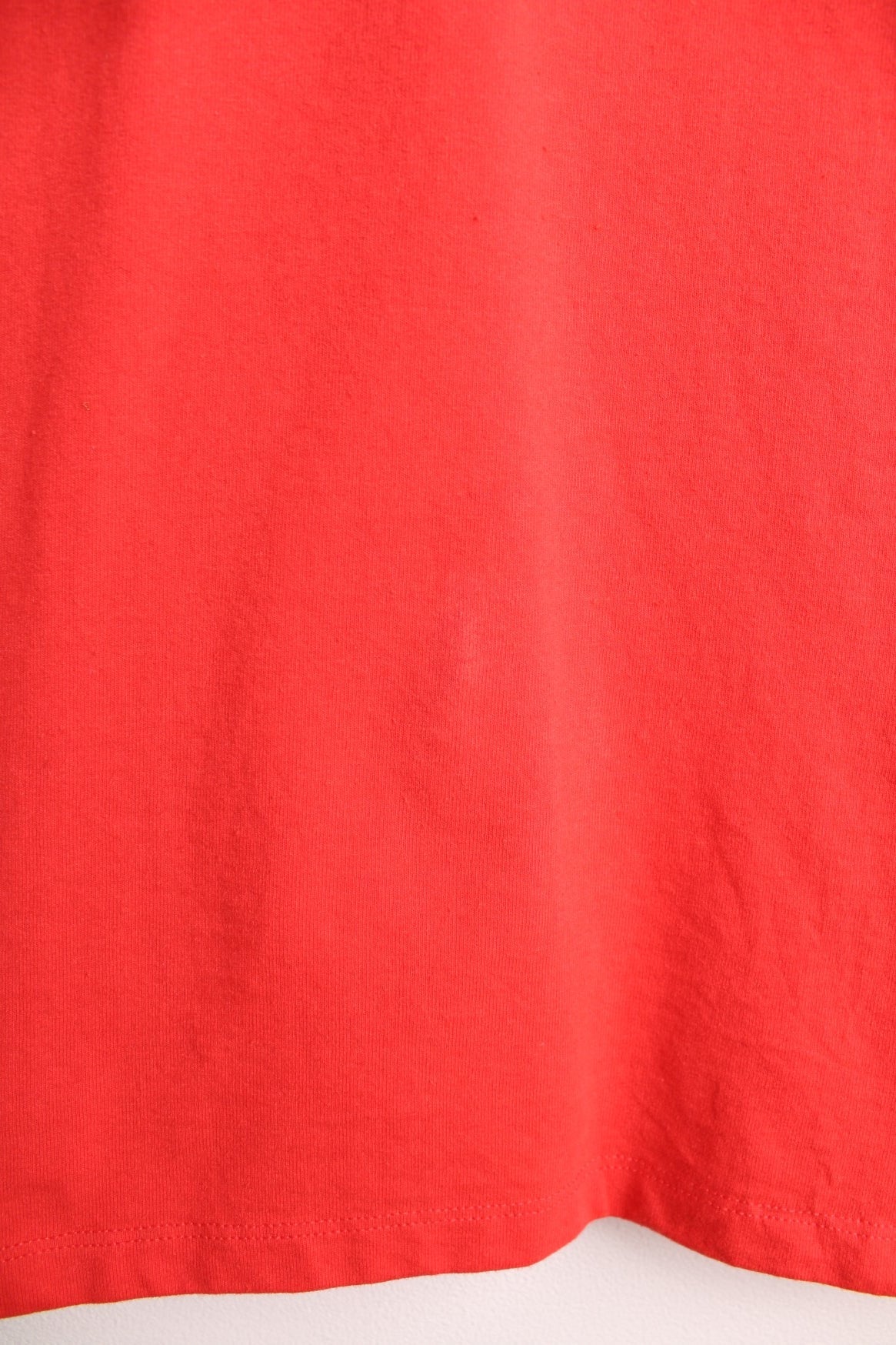 Red North Face long-sleeved t-shirt with &