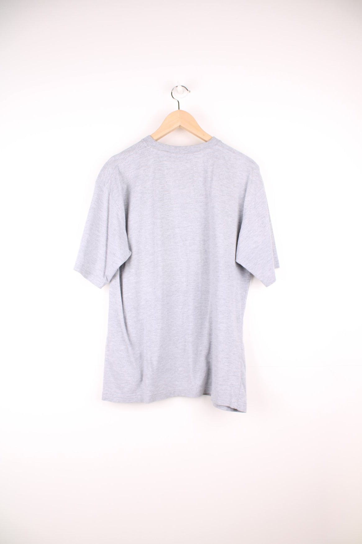 Grey Reebok tee with breast pocket and small embroidered logo. 