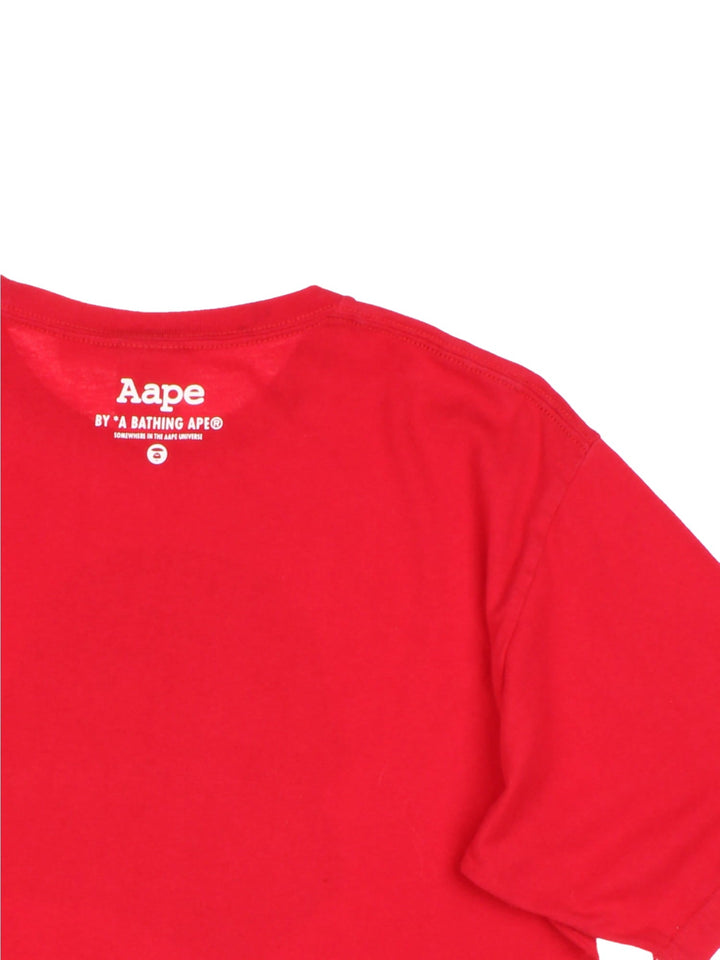 Bape Aape by A Bathing Ape T-Shirt in a red colourway with the logo graphic and spell out printed on the front and back.