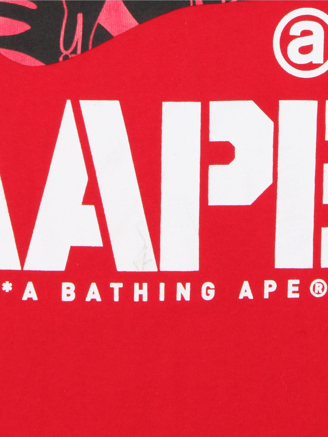 Bape Aape by A Bathing Ape T-Shirt in a red colourway with the logo graphic and spell out printed on the front and back.