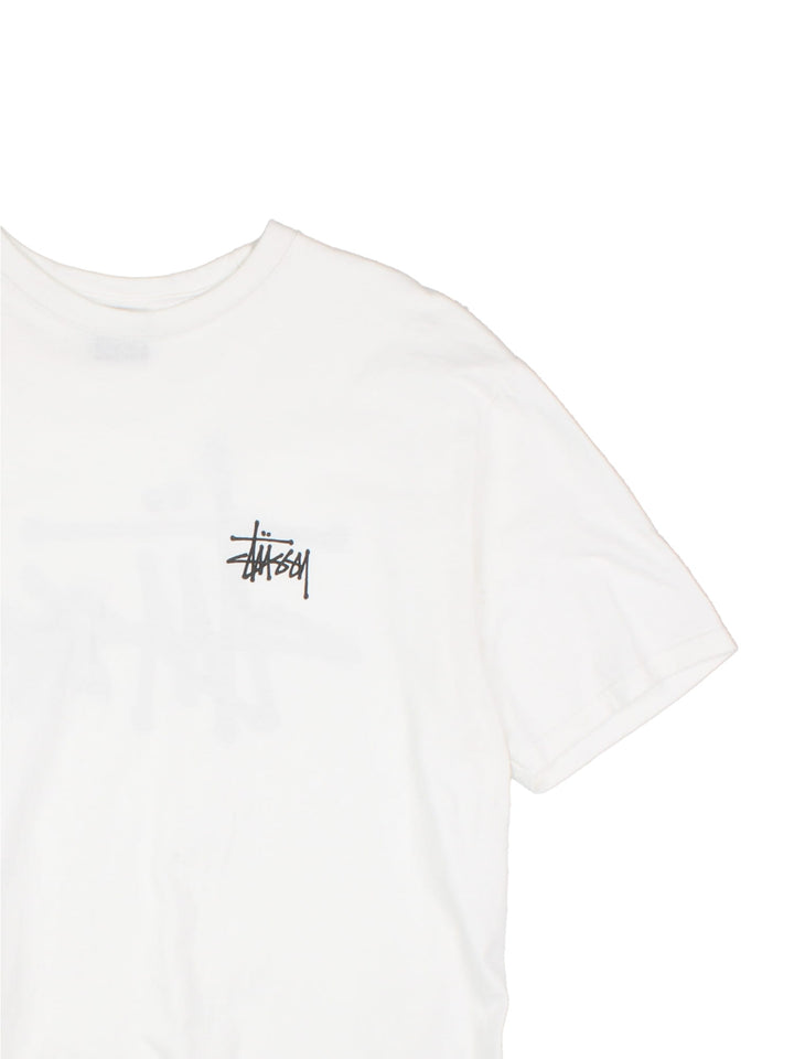 Stussy T-Shirt in a white colourway with the logo printed on the front and back.